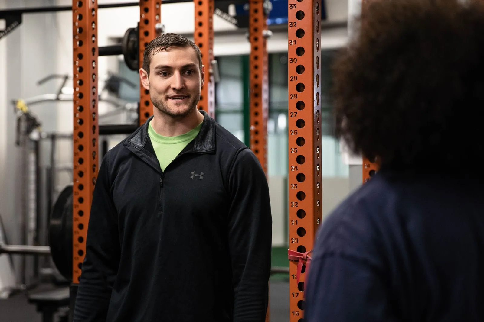 An Impact coach on the training floor