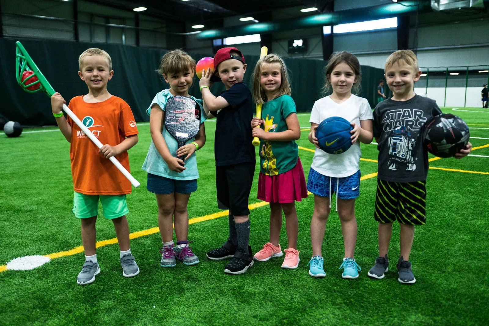 A kids group on the turf